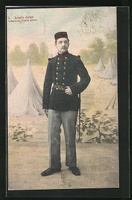 AK-Belgischer-Infanterist-vor-einem-Zeltlager